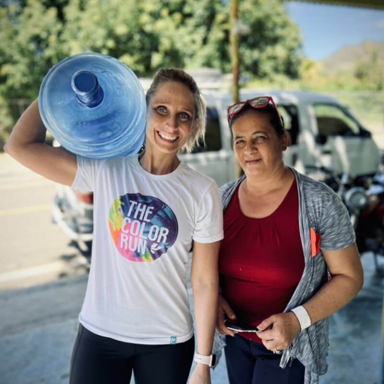 Volunteering helping deliver water
